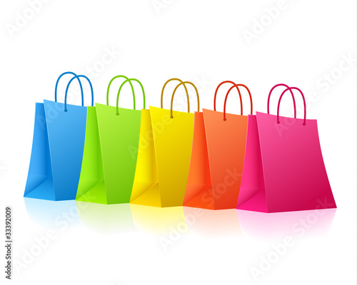 Colorful shopping bags standing in a row