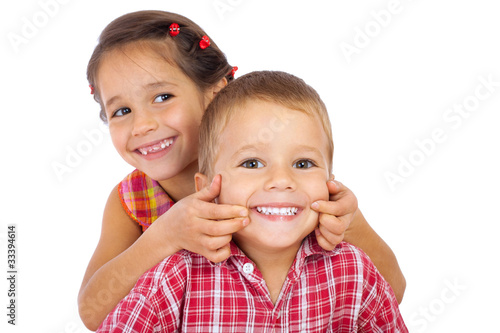 Two funny smiling little children #33394614