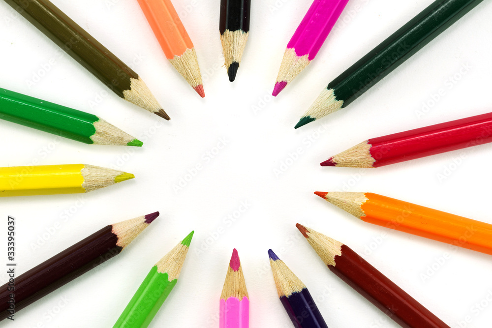 Multicolored pencils over white background Multicolored pencils over white background