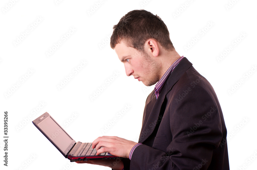 businessman sitting in a jacket with a laptop businessman sitting in a jacket with a laptop