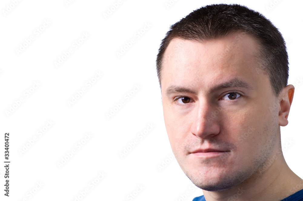 Portrait of an adult man with a smirk face Portrait of an adult man with a smirk face