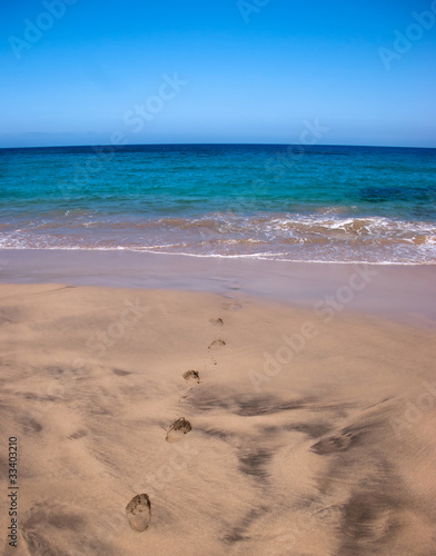 footprints leading to the ocean  playa mujeres  lanzarote