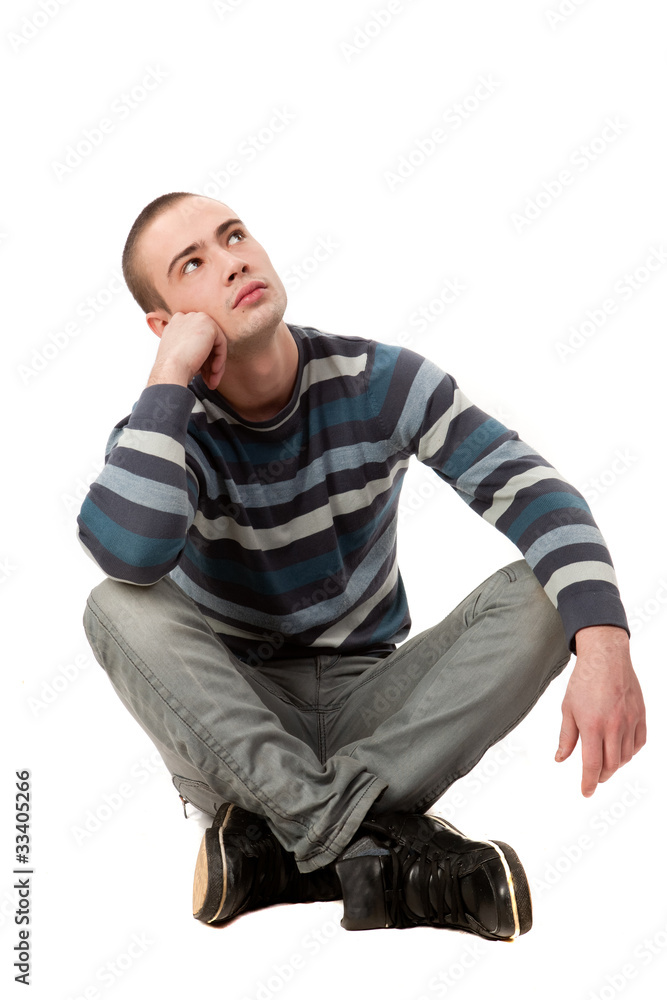 studio picture of a pensive young man, isolated on white studio picture of a pensive young man, isolated on white