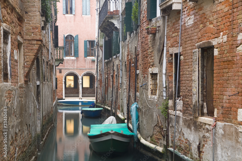 Old Rainy Venice Street and Channels