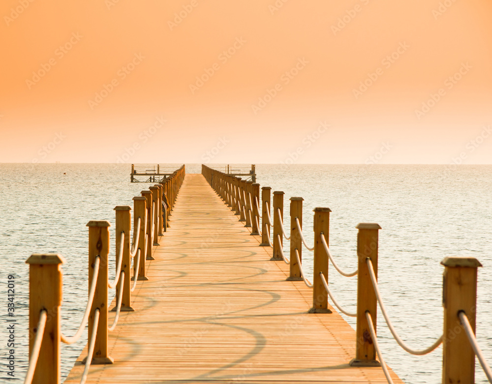 Pier over Sunset Waters