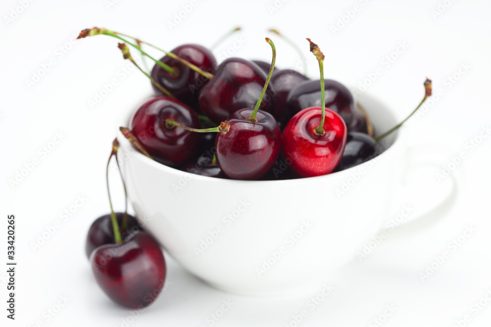 cherries in a bowl isolated on white cherries in a bowl isolated on white