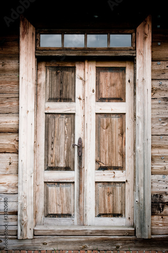 Old door in wooden cottage