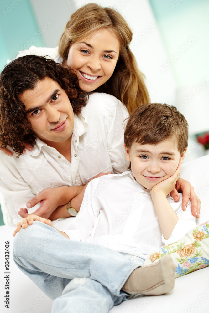 Happy boy and parents