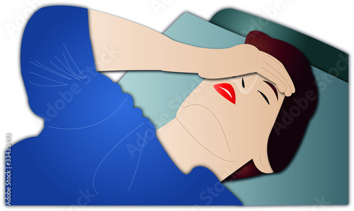Mann mit Kopfschmerzen im Bett