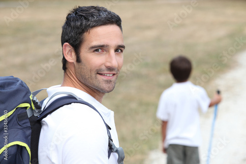 Dad hiking with son