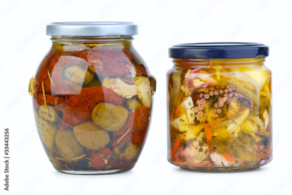 Glass jars with olives and miscellaneous seafood Glass jars with olives and miscellaneous seafood