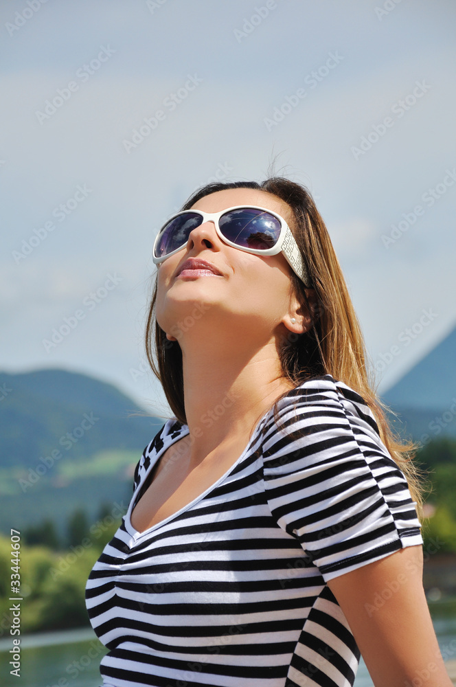 Attractive woman portrait on the lake Attractive woman portrait on the lake
