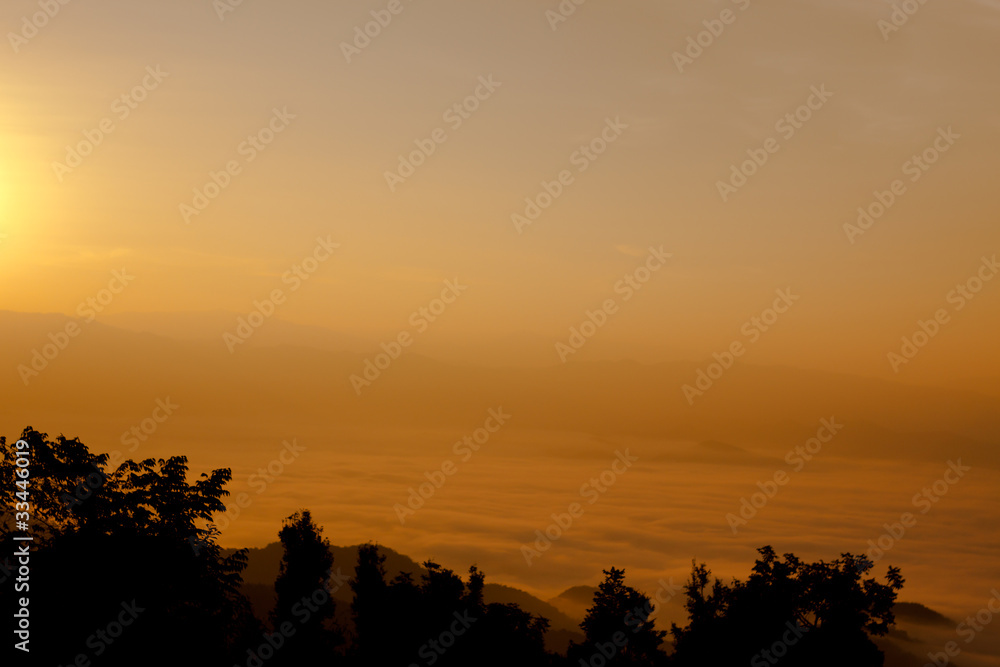 sunrise with fog on the mountain