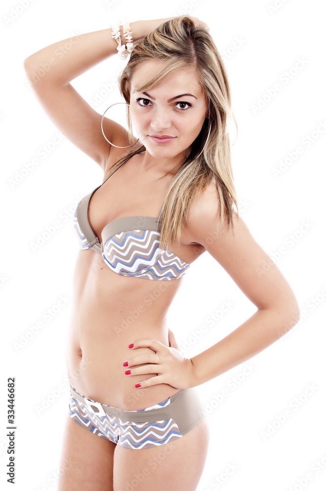 Beautiful blond girl wearing swimming costume