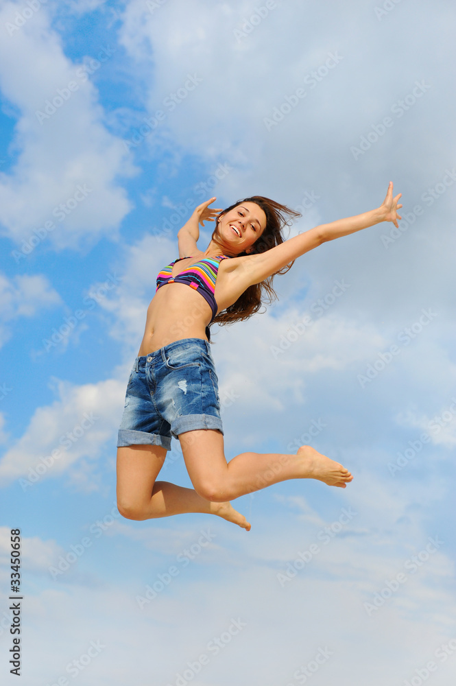 Beautiful Woman over blue Sky