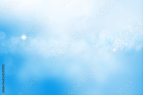 Abstract blue white bokeh light space background