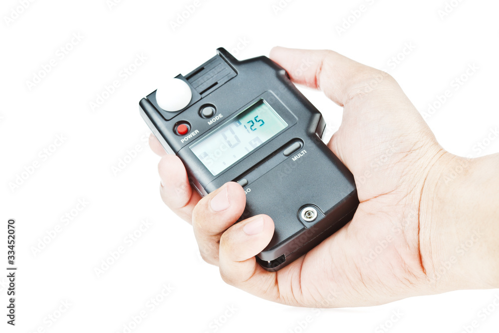 hand holding lightmeter isolated on white background hand holding lightmeter isolated on white background