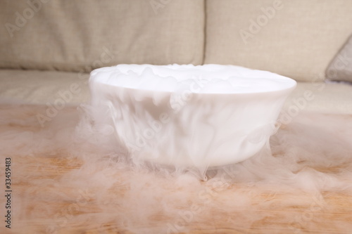smoke of dry ice on table
