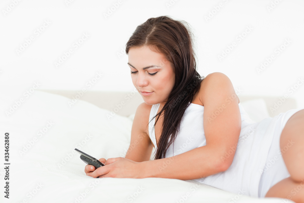 Young brunette texting Young brunette texting