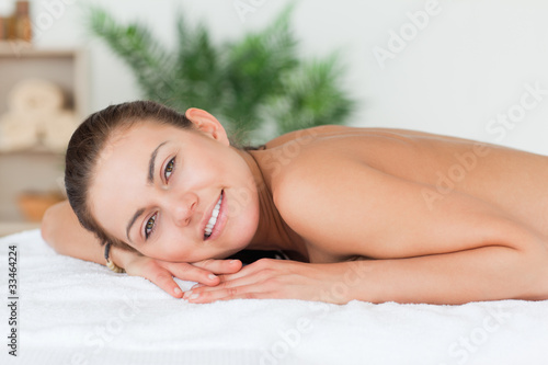 Woman lying on her belly waiting for a massage