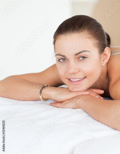 Portrait of a woman lying on a massage table