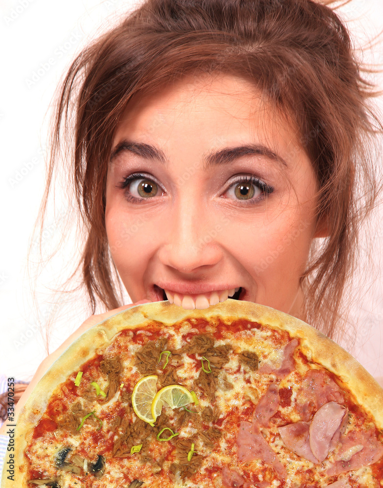 Cute brunet girl eatin pizza