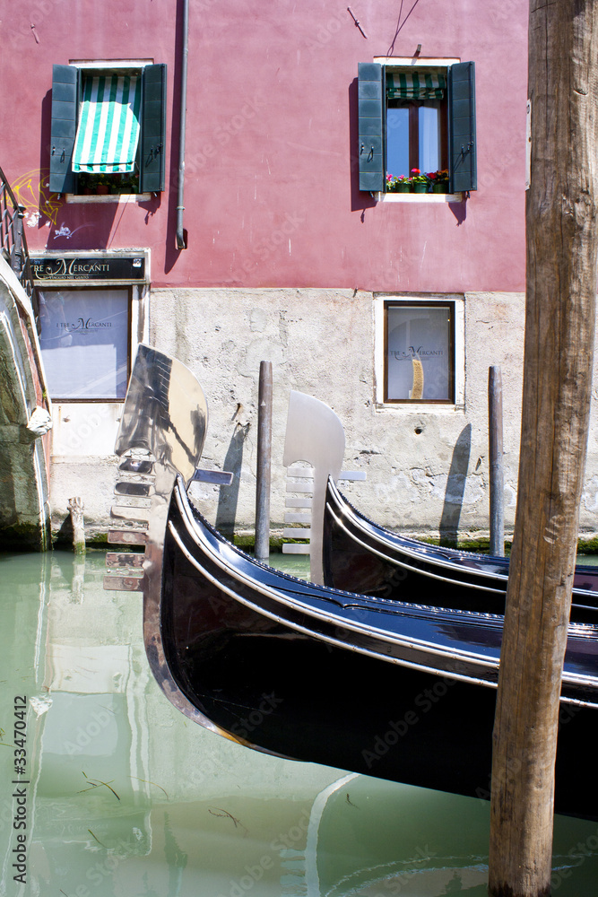 Gondola in canal Venice