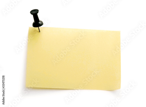 yellow note with black pin