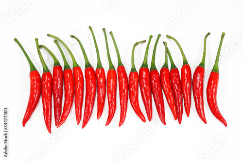 Stock Photo: Red chili peppers on a white background
