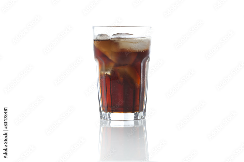 Brown soda in a clear glass Brown soda in a clear glass