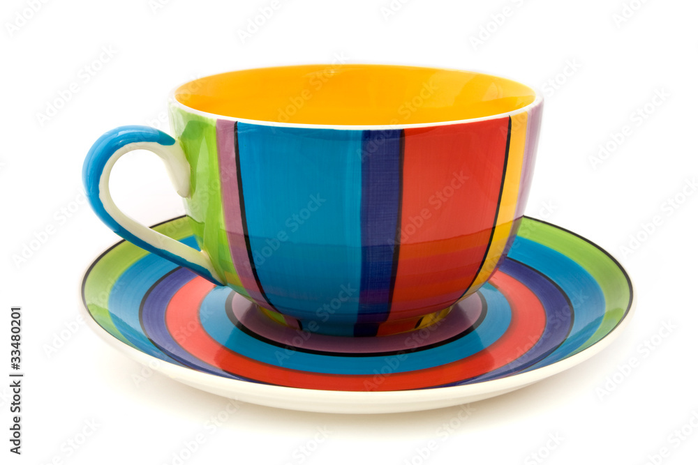 Stripy cup and saucer isolated on white Stripy cup and saucer isolated on white