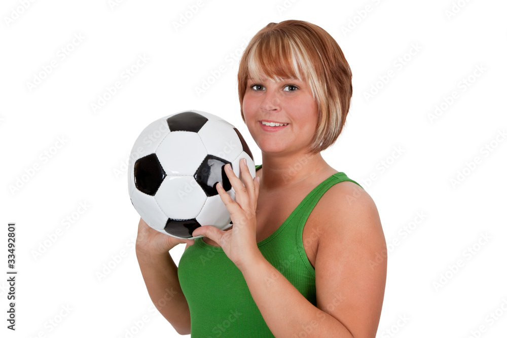 Junge Frau hält Fußball