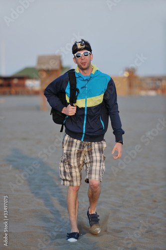 man relax on beach photo