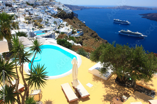 pool overlooking the caldera of santorini island in  greece