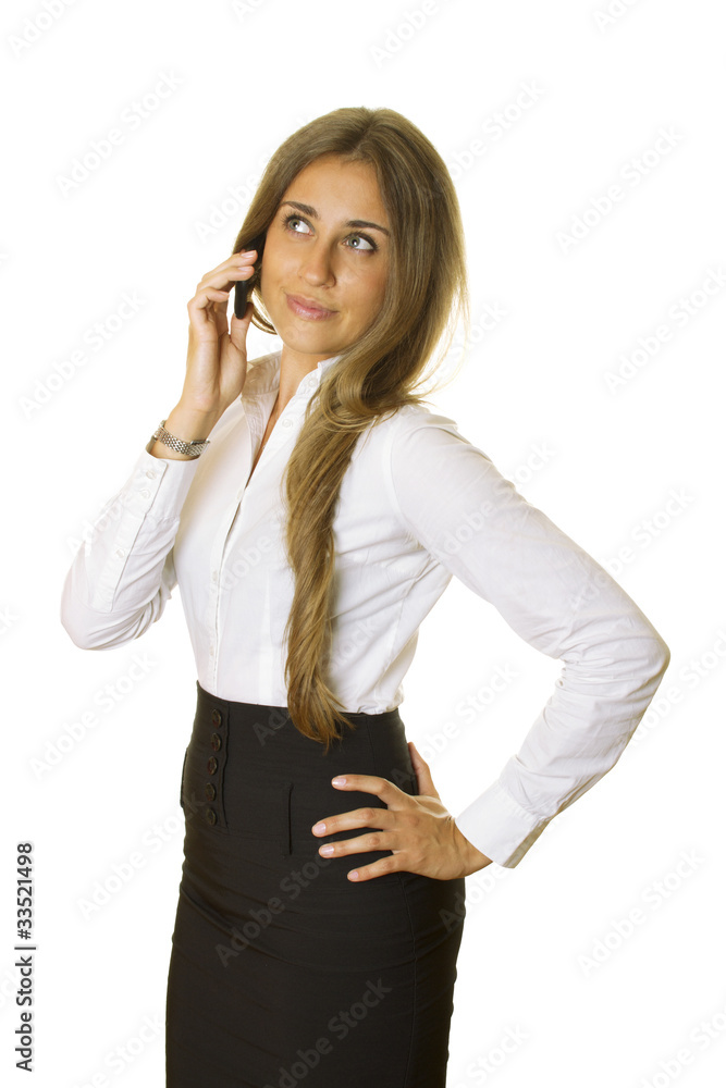 Attractive business woman talking on the phone Attractive business woman talking on the phone