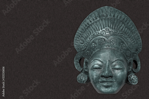 old cultural and historical mask on grunge background