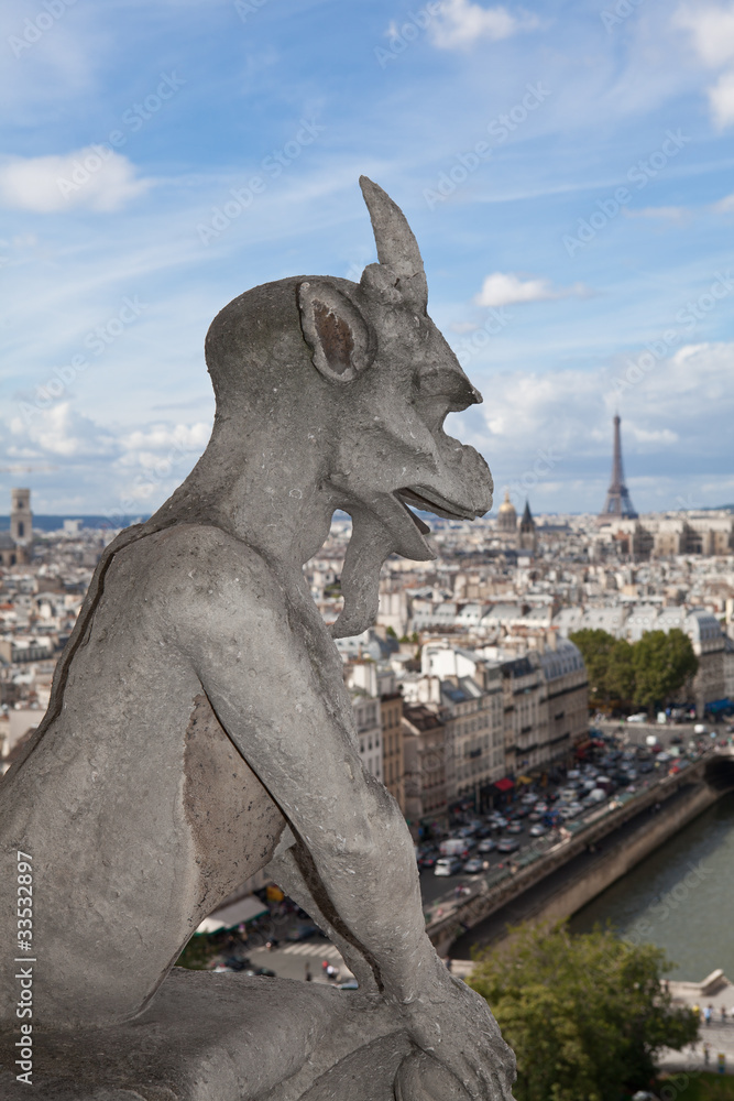 Gargoyle Statue cathedral Notre Dame, top view on tower Eiffel