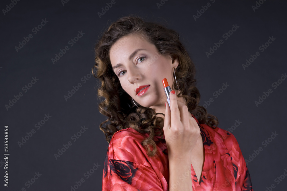 Beautiful young woman with lipstick Beautiful young woman with lipstick