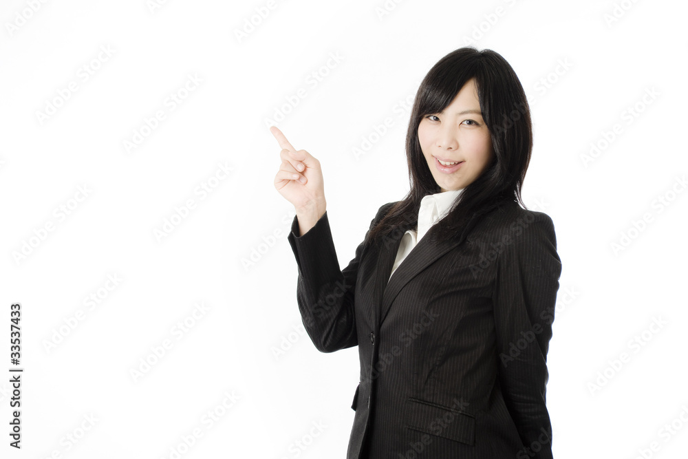 指差す女性社員 指差す女性社員