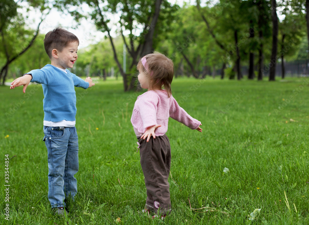 Fototapeta premium happy sister and brother outdoors