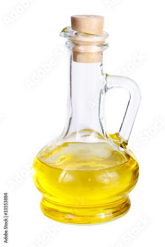 Small decanter with  olive oil isolated on the white background