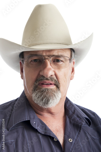 Old cowboy wearing glasses