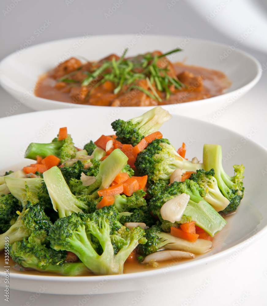 Curry chicken with vegetables, fried broccoli