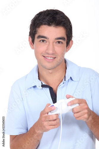 Teenager playing computer games