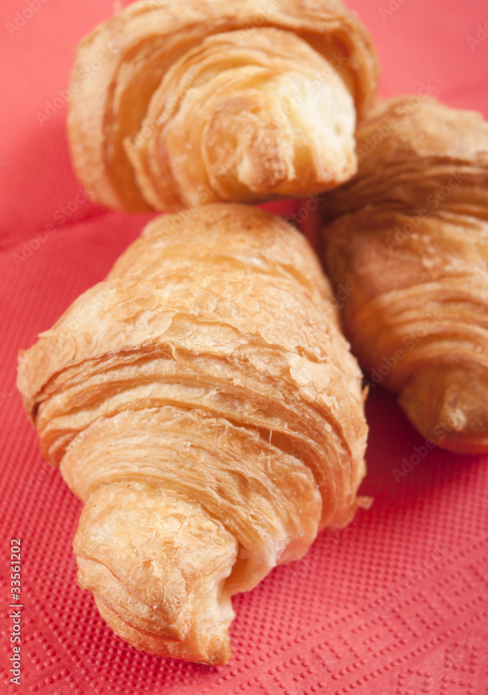 croissants close up on a red napkin