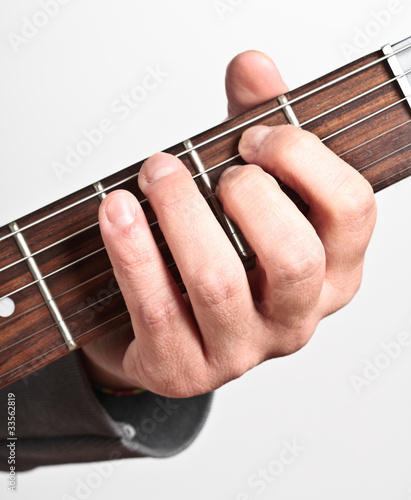 Performer playing electric guitar