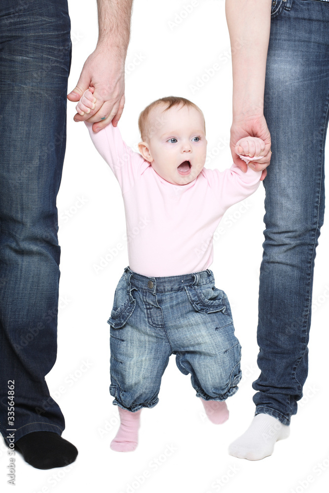 Beginning to go the child keeps for hands of parents Beginning to go the child keeps for hands of parents