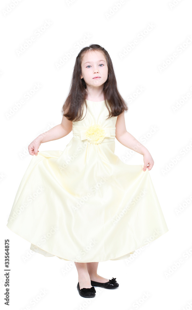 five years' girl with long hair with an elegant dress
