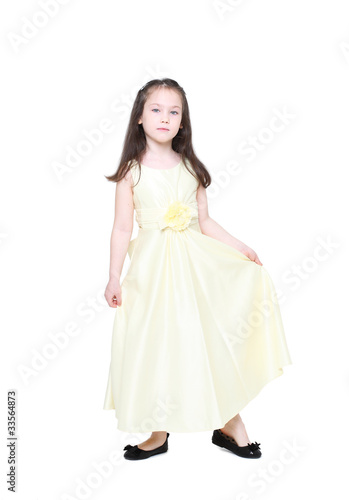 five years  girl with long hair with an elegant dress