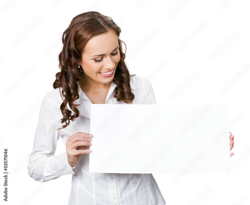 Smiling businesswoman showing blank signboard, isolated Smiling businesswoman showing blank signboard, isolated